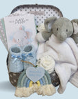 Small baby boy gifts hamper with elephant comforter and blue booties.
