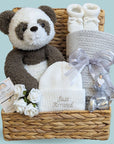 New baby hamper gifts with panda bear, baby hat, blanket, booties and bracelet.