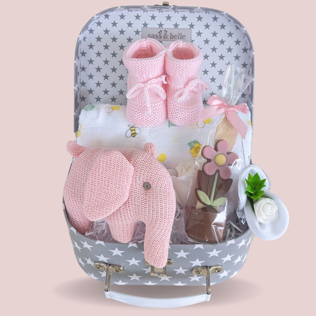small baby shower gifts hamper with organic elephant, baby booties, muslin wrap, mittens and chocolate for mum.