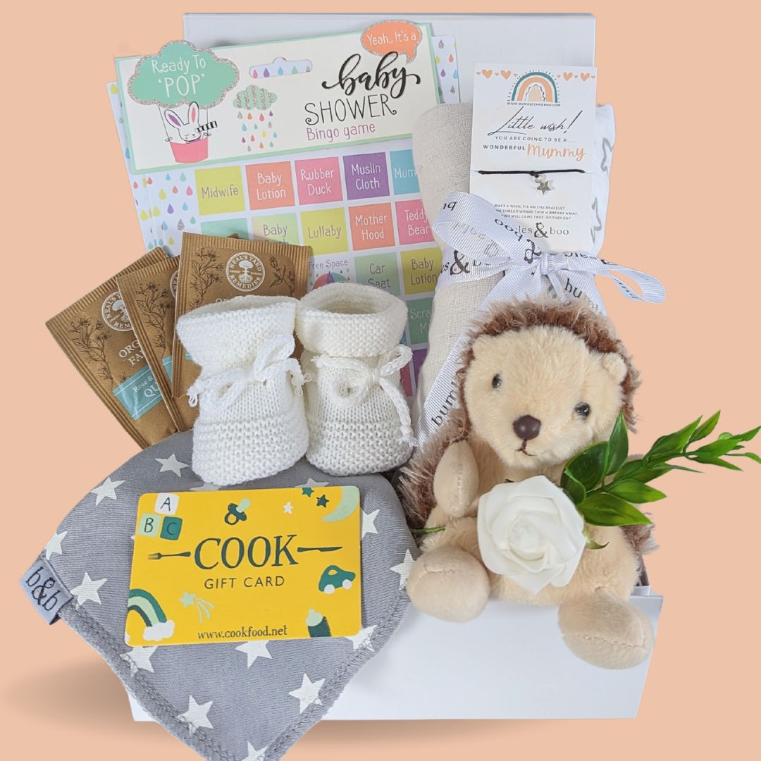 baby shower gifts hamper for mum and baby. Box includes soft toy, blanket, baby shower game and cook vouchers.