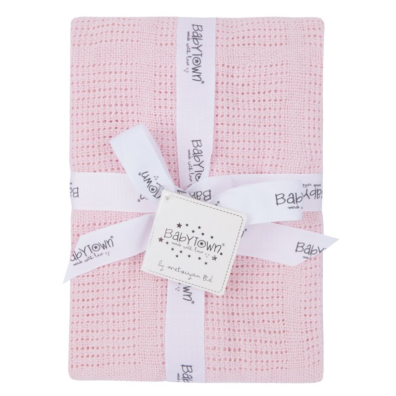 A 70 x 90 cm classic pink cellular baby blanket