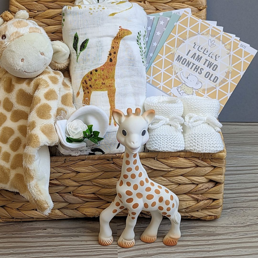 Baby hamper basket gift with giraffe theme. Presented in an eco-friendly basket.