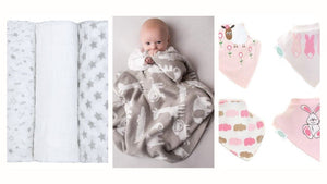 Baby essentials inc blanket, bibs and muslins.