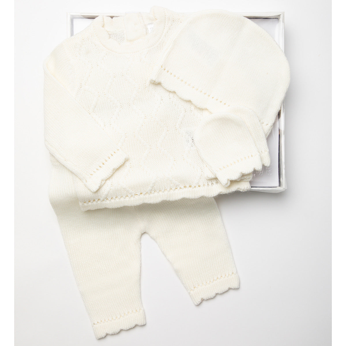 White cream knitted 4 pc set.  Top, trousers, hat,mittens