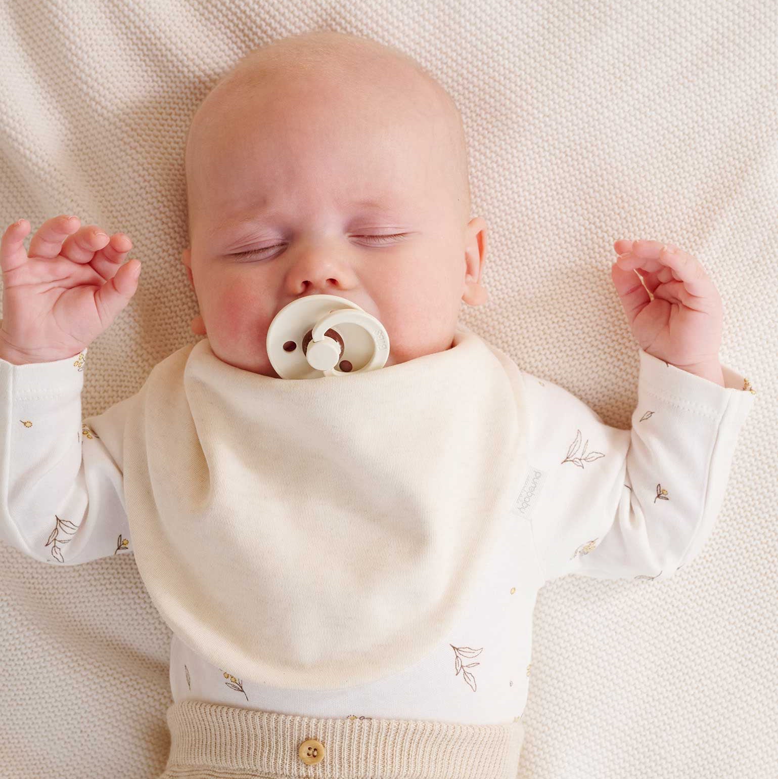 2 pack of Bumbles & Boo organic cotton dribble bibs in vanilla and neutral bear print