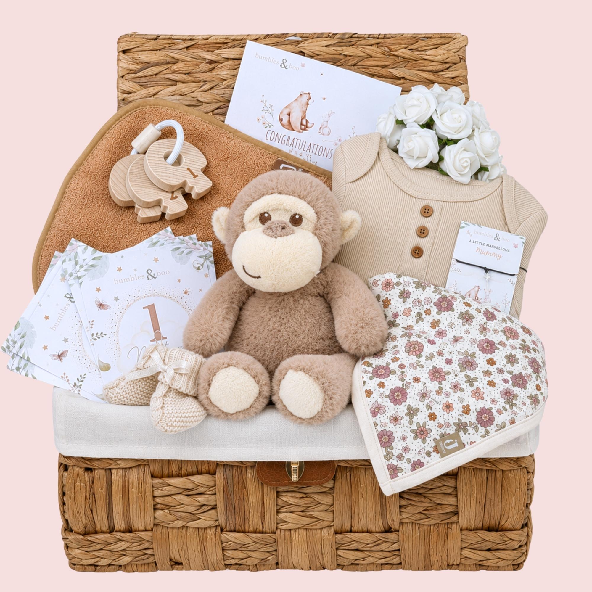 Baby girl gifts hamper basket with a bunny and beige theme. Presents by bumbles and boo.