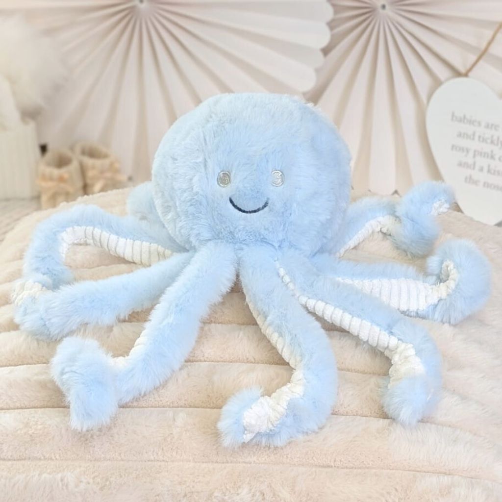Blue plush octopus soft baby toy made from recycled materials. Suitable from birth. 