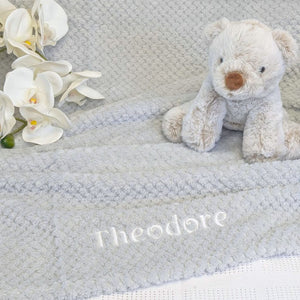 Soft Grey fluffy waffle baby blanket that has been personalised with name. Suitable from birth. 