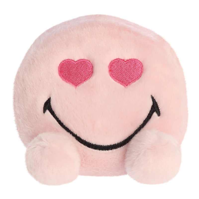 Pink soft plushy that fits in the palm of your hand with eyes shapes as pink hearts
