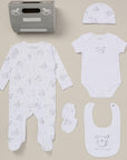 white and grey newborn clothing set
