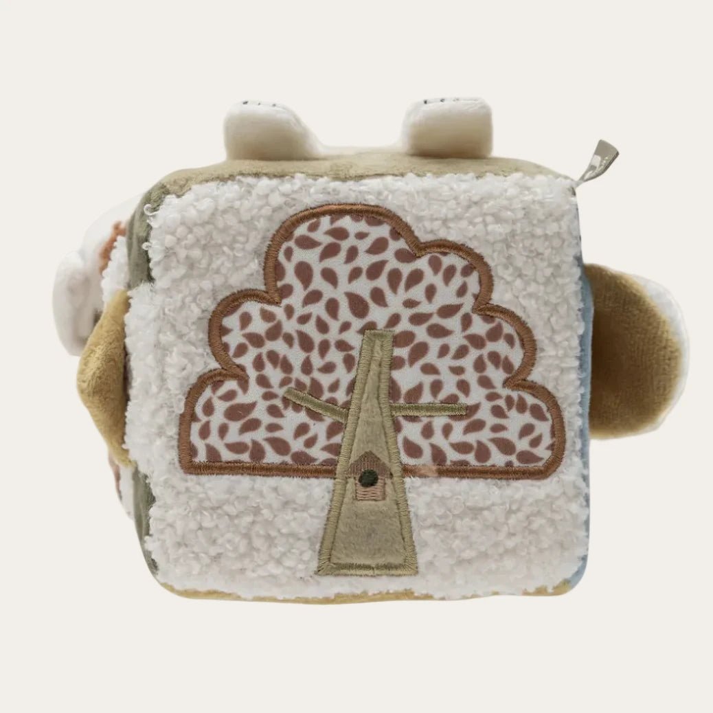 Plush toy with a tree design on a white background