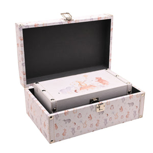Larger keepsake box open with the smaller illustrated box nested inside its dark interior.