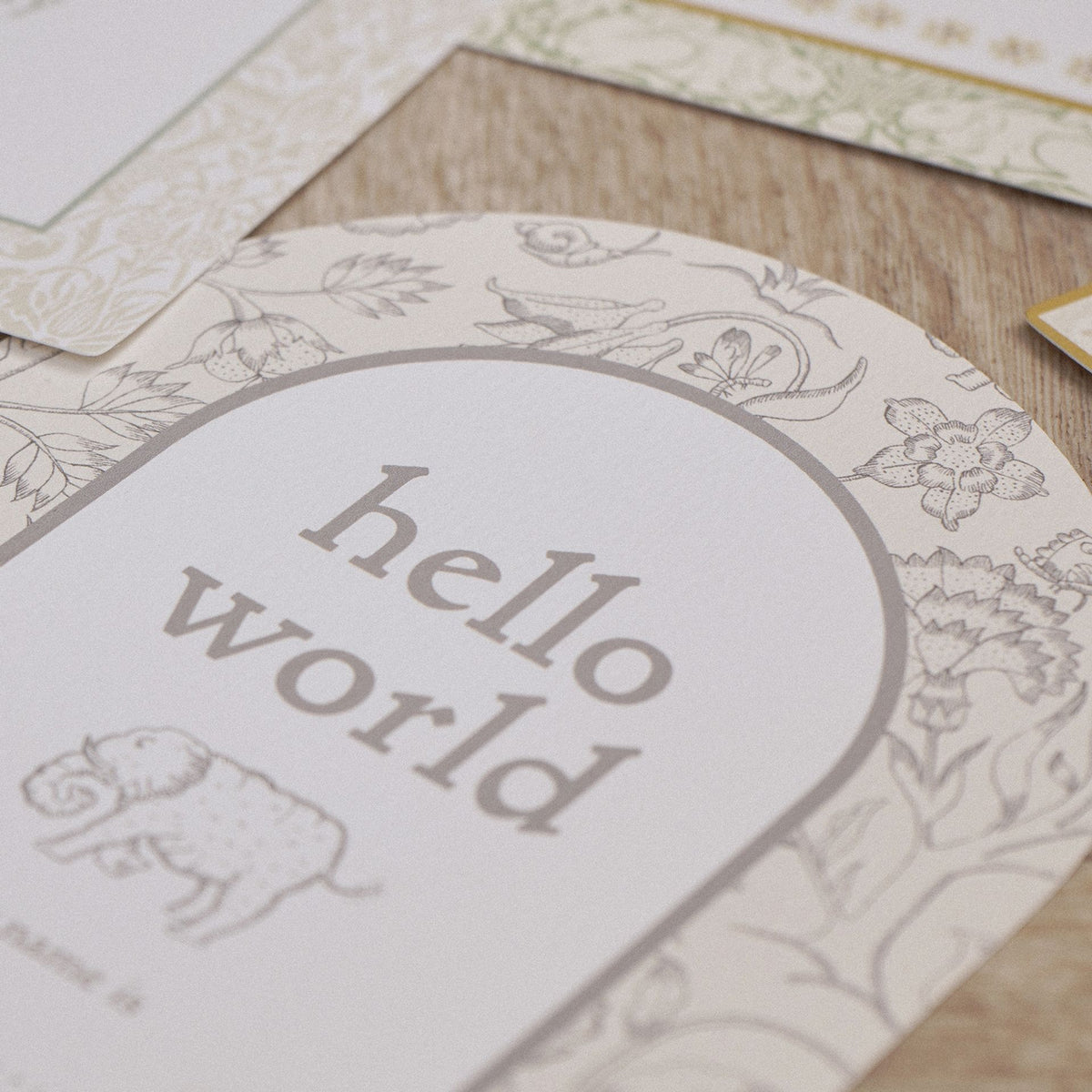 Close-up of the floral hello world milestone card