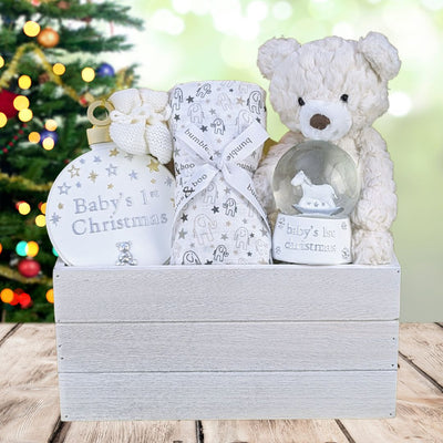 Christmas gift box with white teddy and other white products.