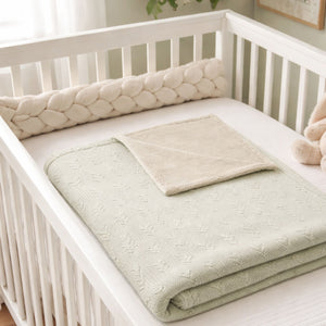 An olive baby blanket in a large size perfect for a baby cot or in a baby nursery