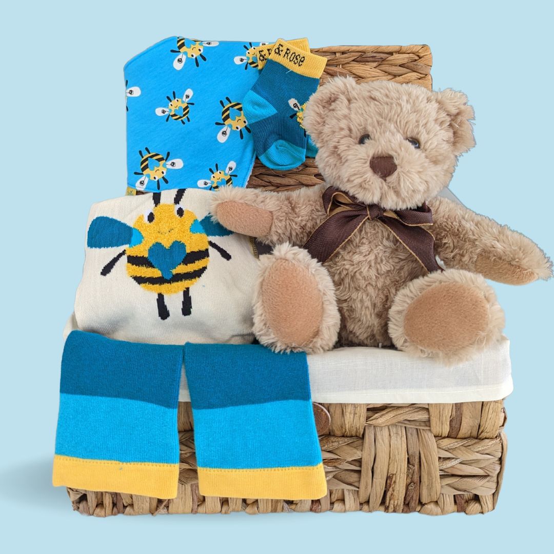 baby boy gifts hamper with teddy bear and bee clothing set.