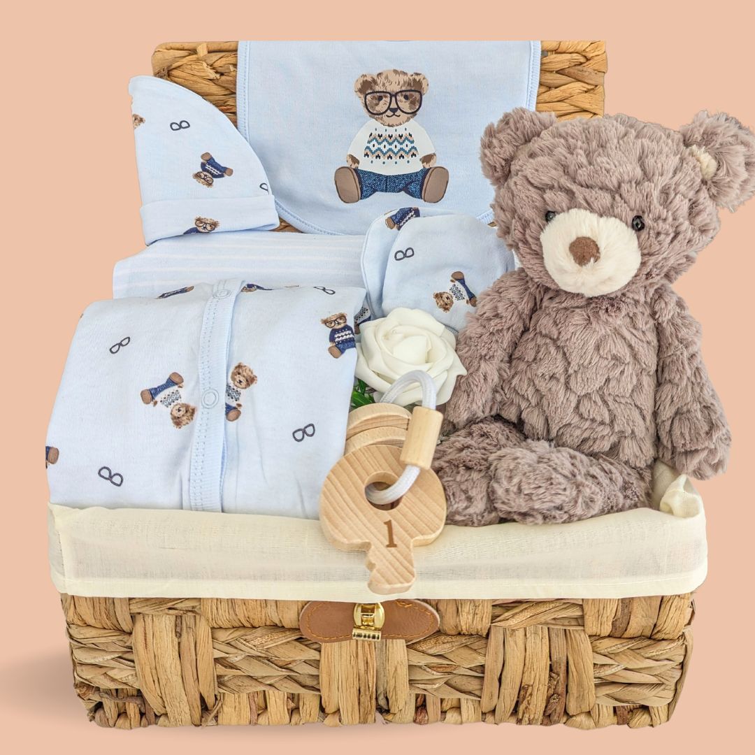 Baby boy hamper with cute bear baby clothing set, cuddly teddy bear soft toy and baby teething keys.