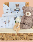 Baby boy hamper, gifts include brown teddy bear, baby clothing gift set and baby teething keys.