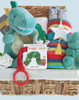 Baby boy hamper with colourful knit blanket, dinosaur soft toy and rattle, cotton muslin wrap, hanging nursery plaque, baby booties and chocolates for the new parents. Beautifully presented in an eco keepsake basket. 