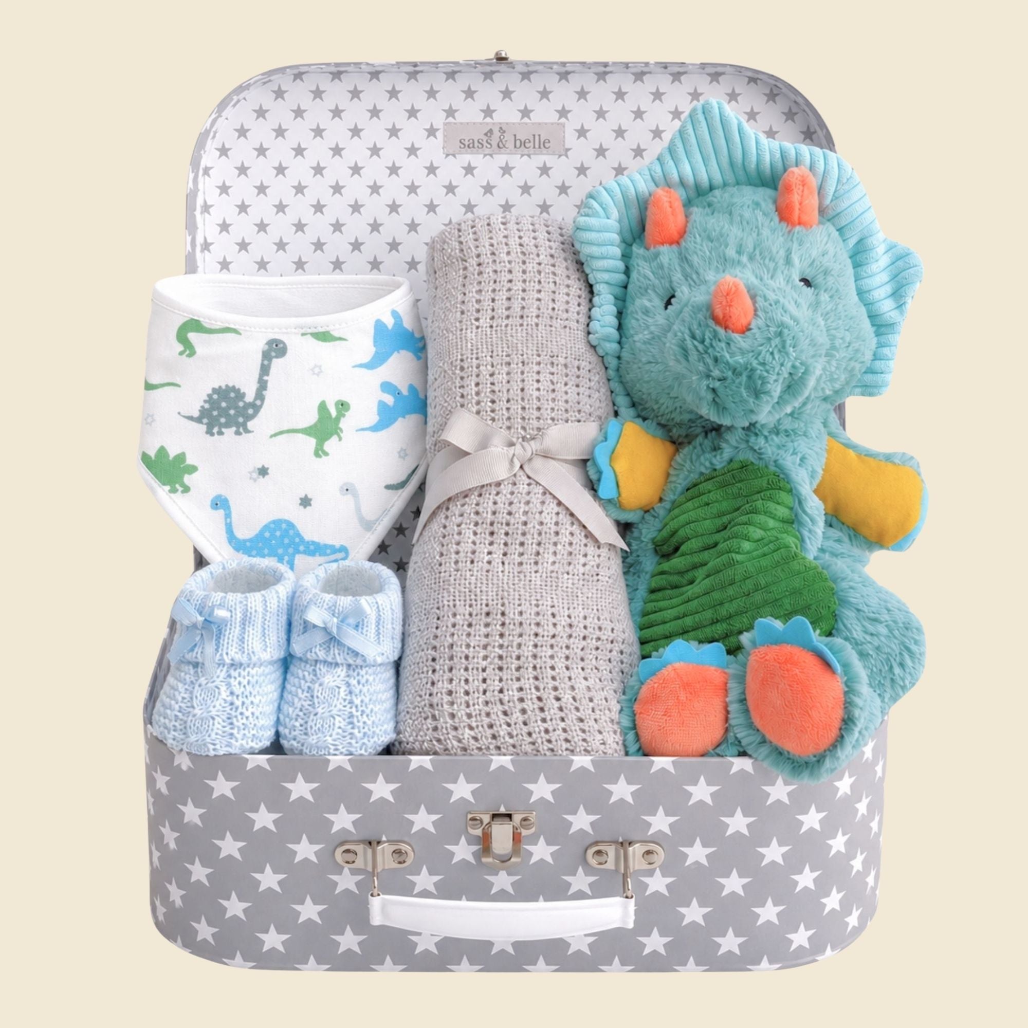 baby boy hamper with gifts including dinosaur soft toy, grey cellular blanket, muslin and baby booties.