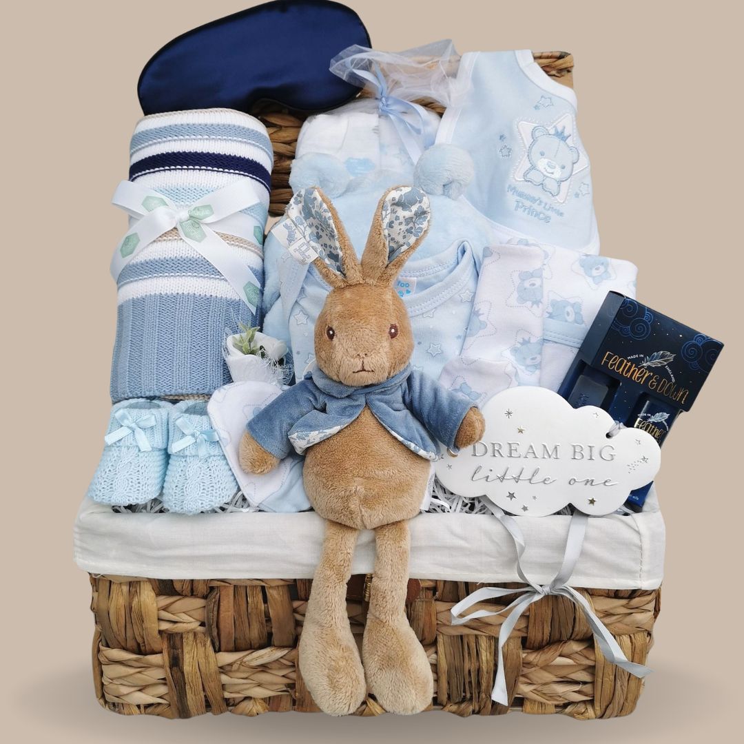 Baby boy gift hamper basket packed with gifts.