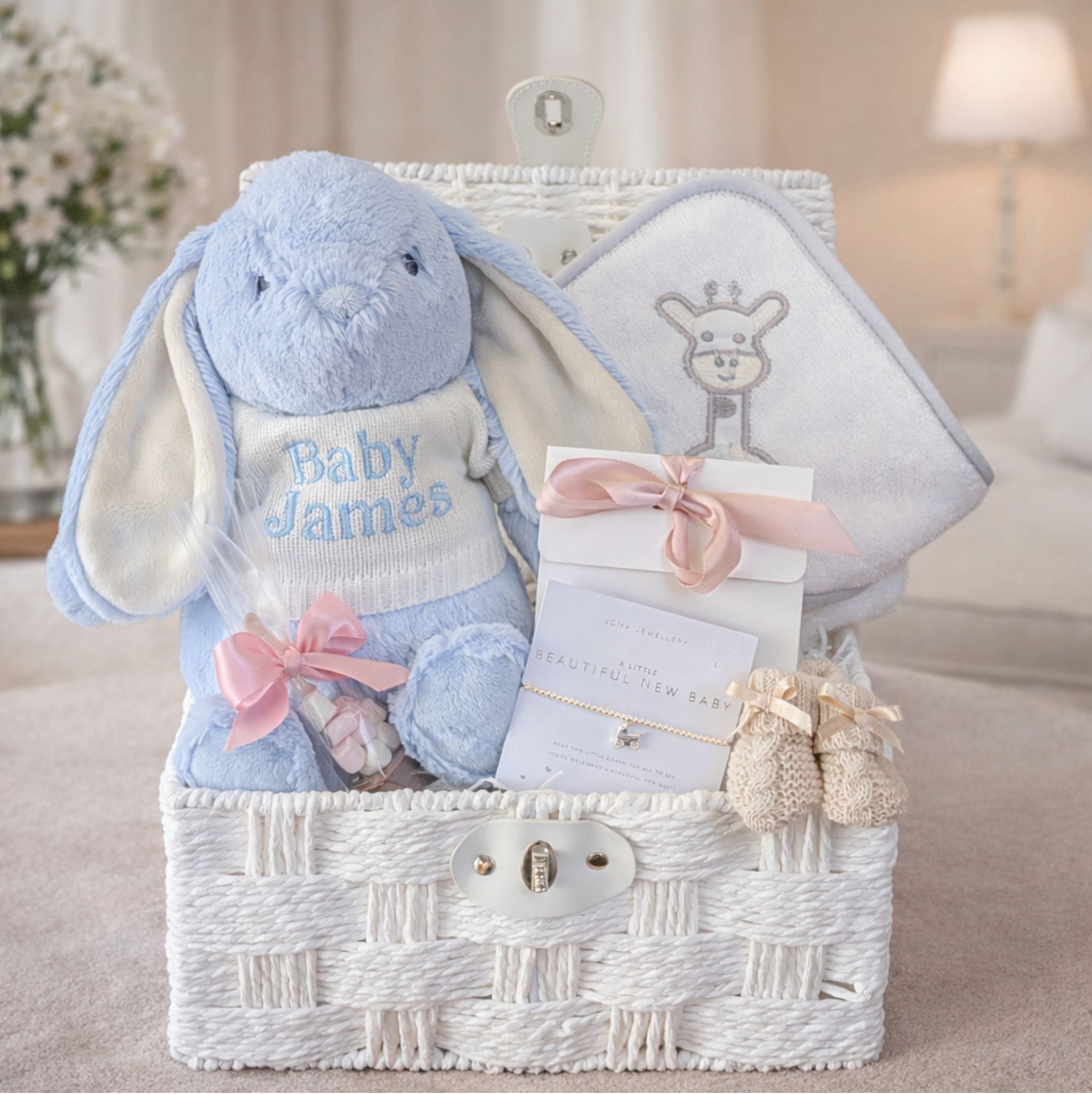 Baby boy hampers with personalised blue bunny and giraffe baby towel