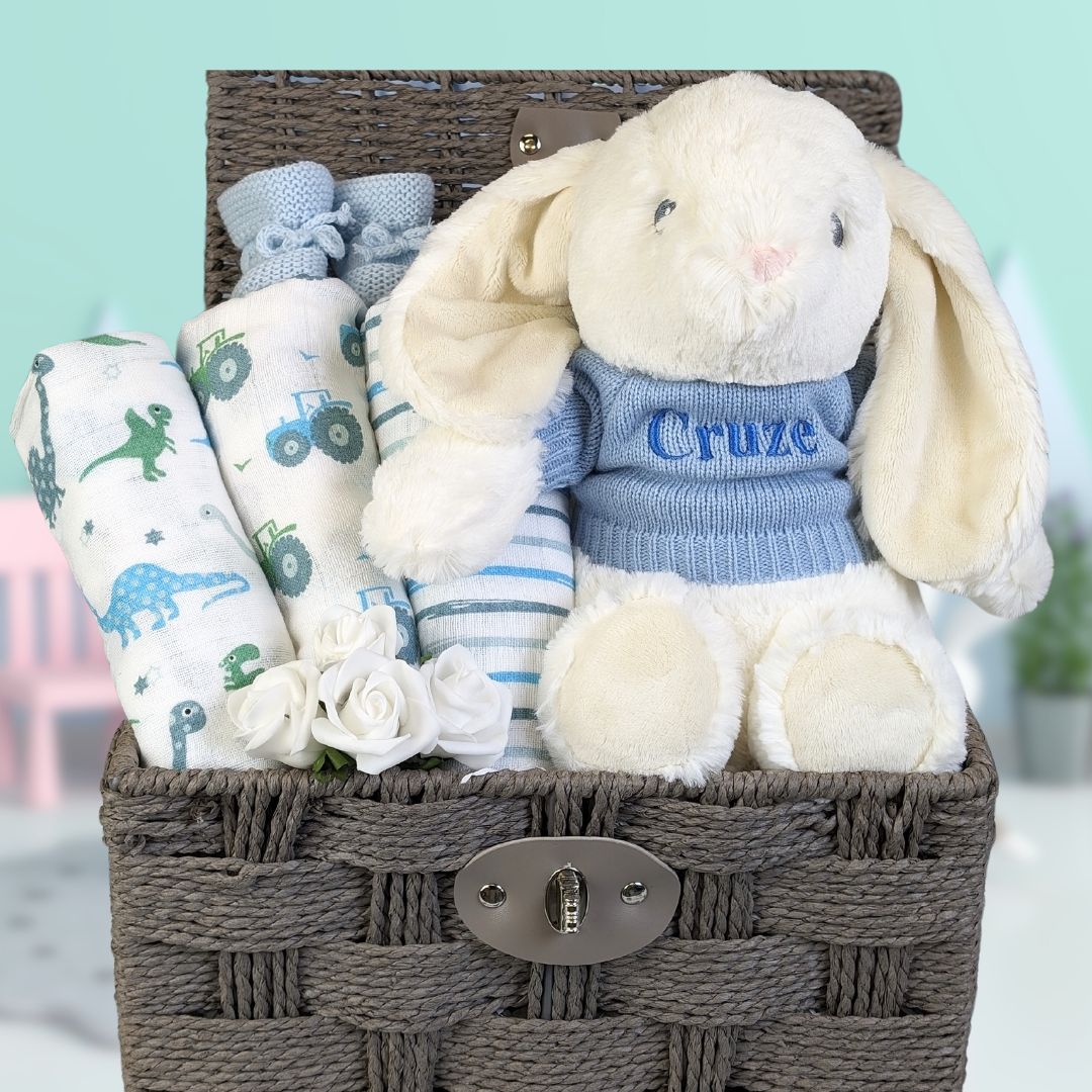 Baby boy hamper gift with muslin squares and large bunny wrap.