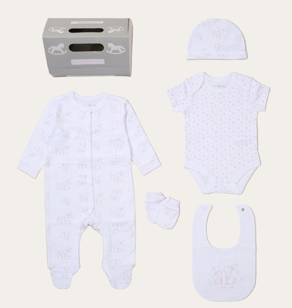 White baby clothing set with onesie, bodysuit, hat, bib & mittens with a bunny pattern