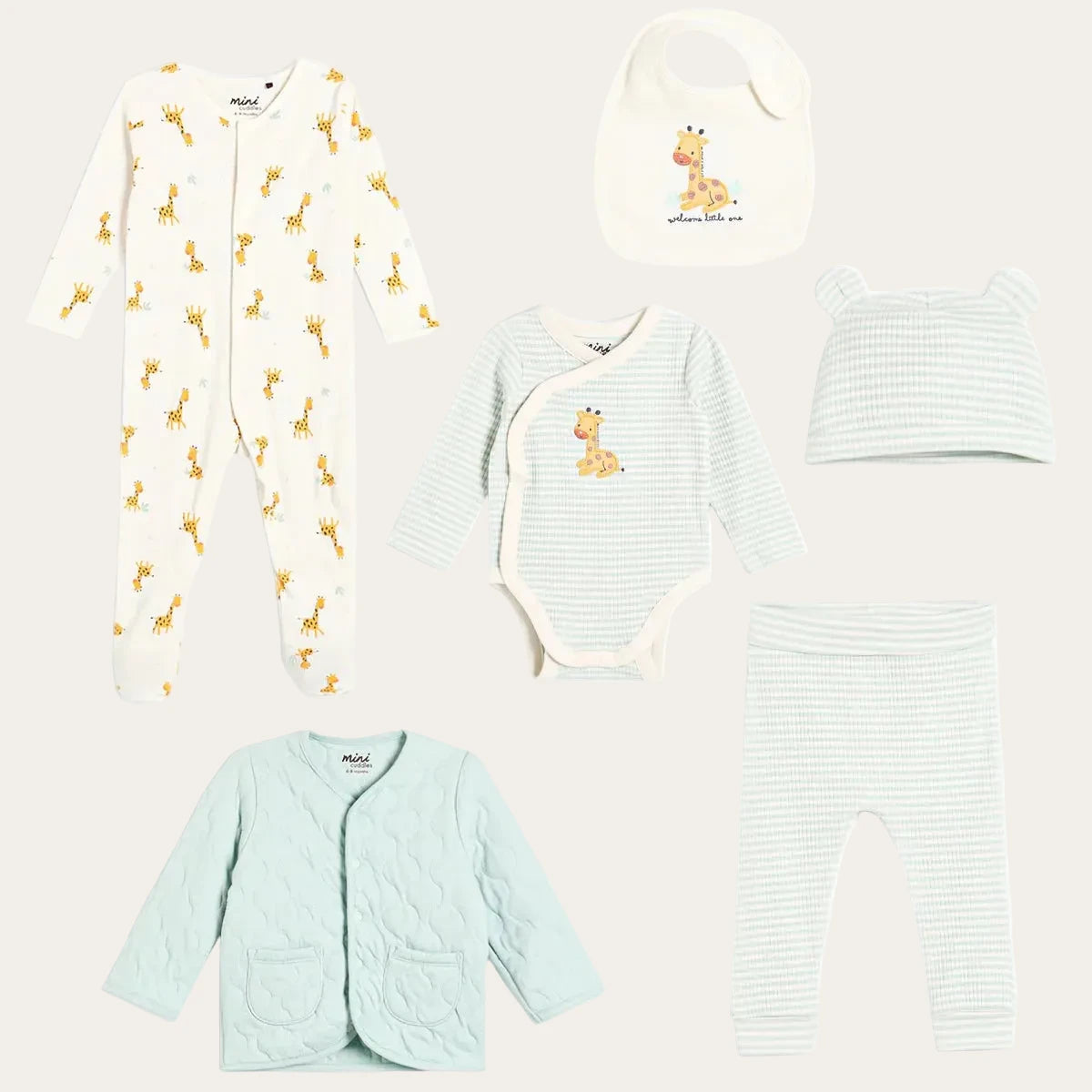 Unosex baby clothing set with giraffe them in white and mint