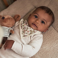 Pink and cream flower print jersey bandana baby bib Jollein. 
