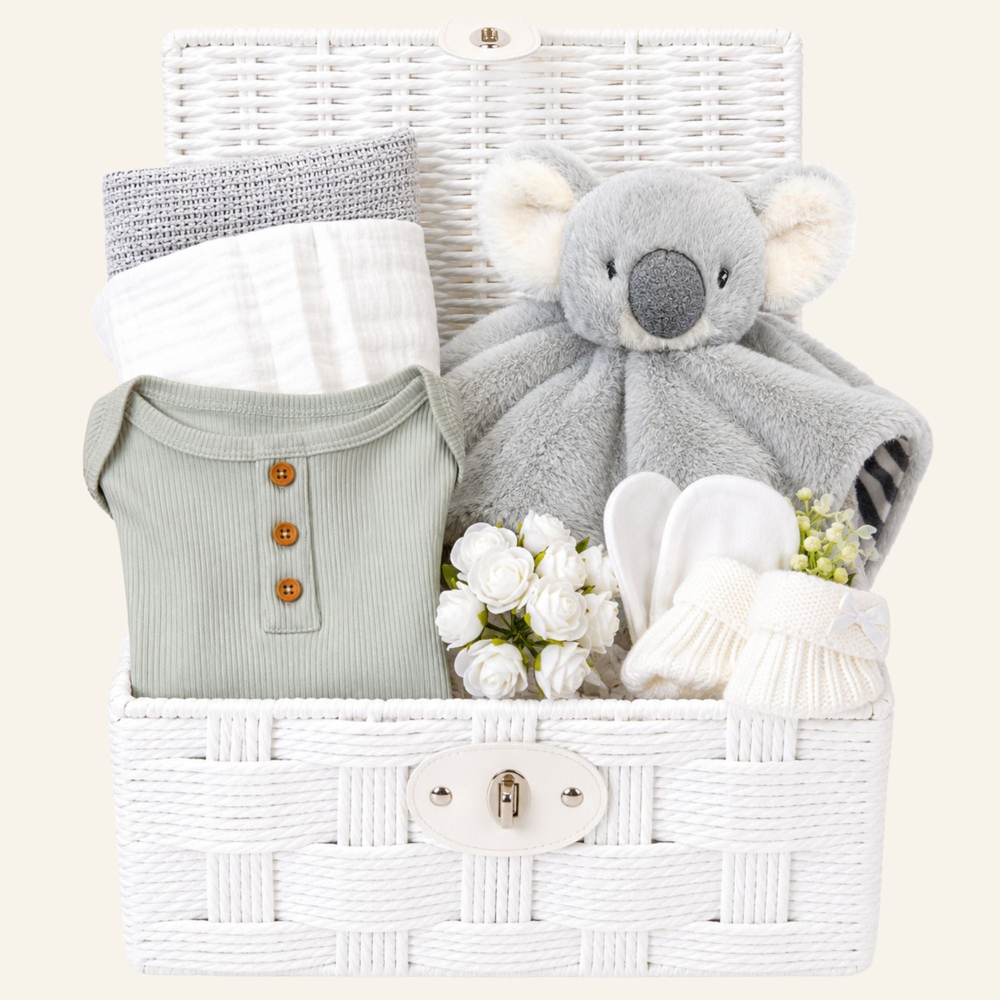 New baby gifts basket with white and grey presents. This baby hamper includes soft koala comforter toy and baby essentials. Bumbles and Boo.