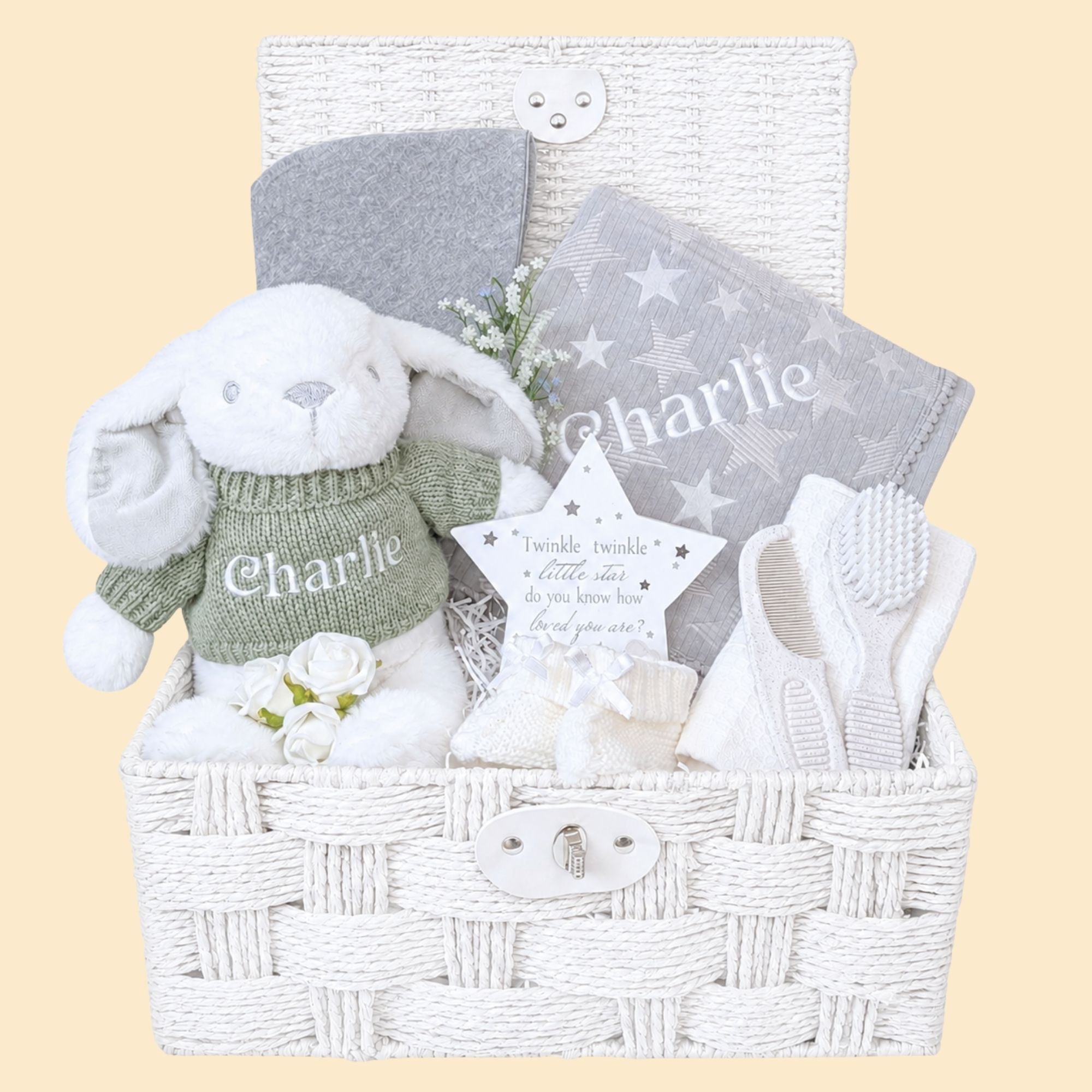Personalised new baby gifts hamper basket by Bumbles and Boo. Presents include a soft grey blanket and white bunny plush soft toy.