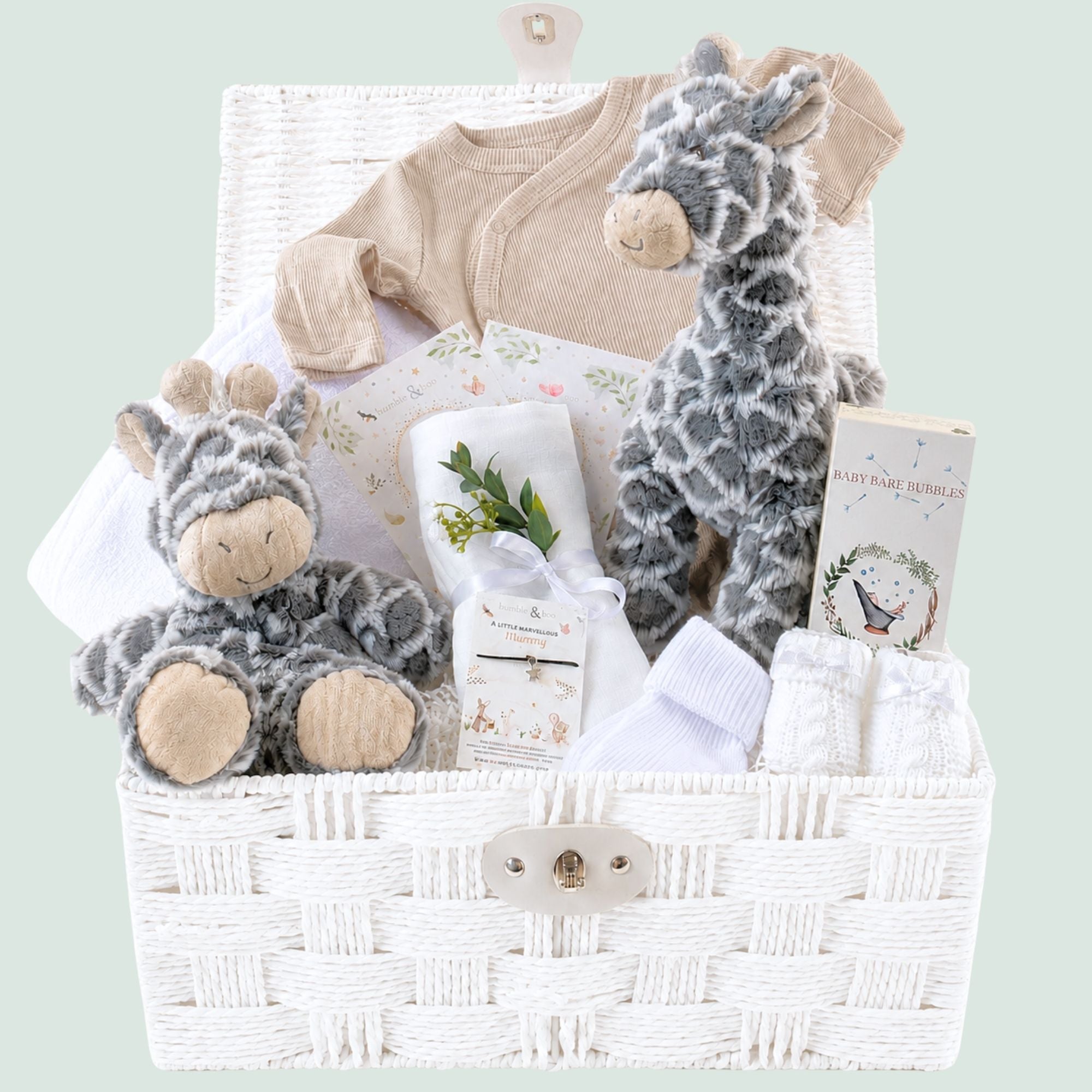 White baby gifts hamper with giraffe soft toy and matching giraffe comforter with hooded towel