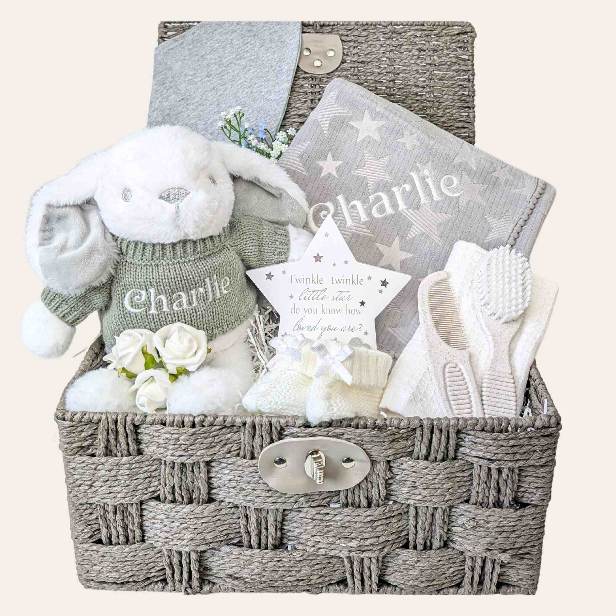 Personalised new baby gifts hamper basket by Bumbles and Boo. Presents include a soft grey blanket and white bunny plush soft toy.
