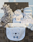 baby gifts basket with clothing set, giraffe soft toy, baby blanket, knit booties and a gift for mum.