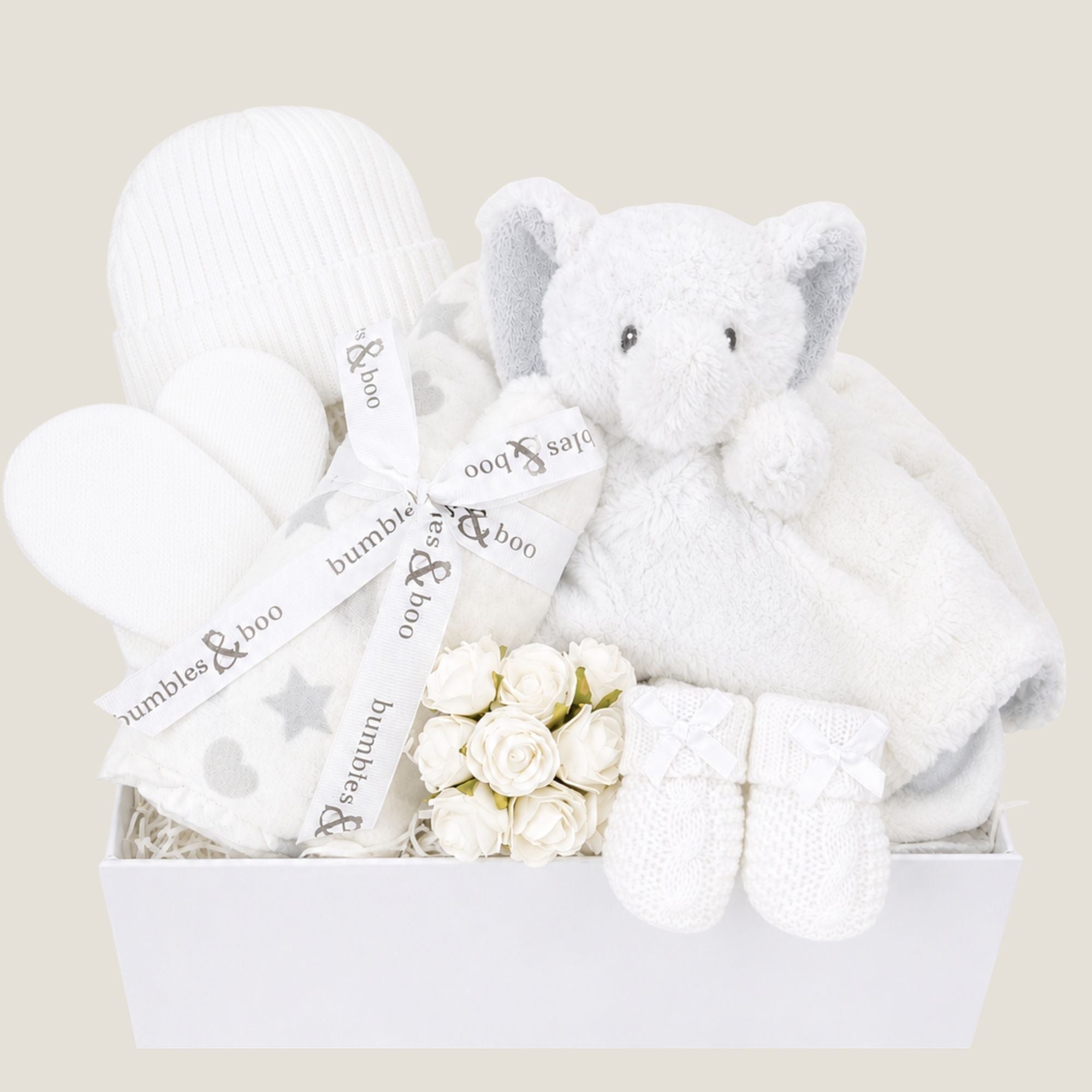 Baby gifts box with white and grey presents to welcome a new baby.