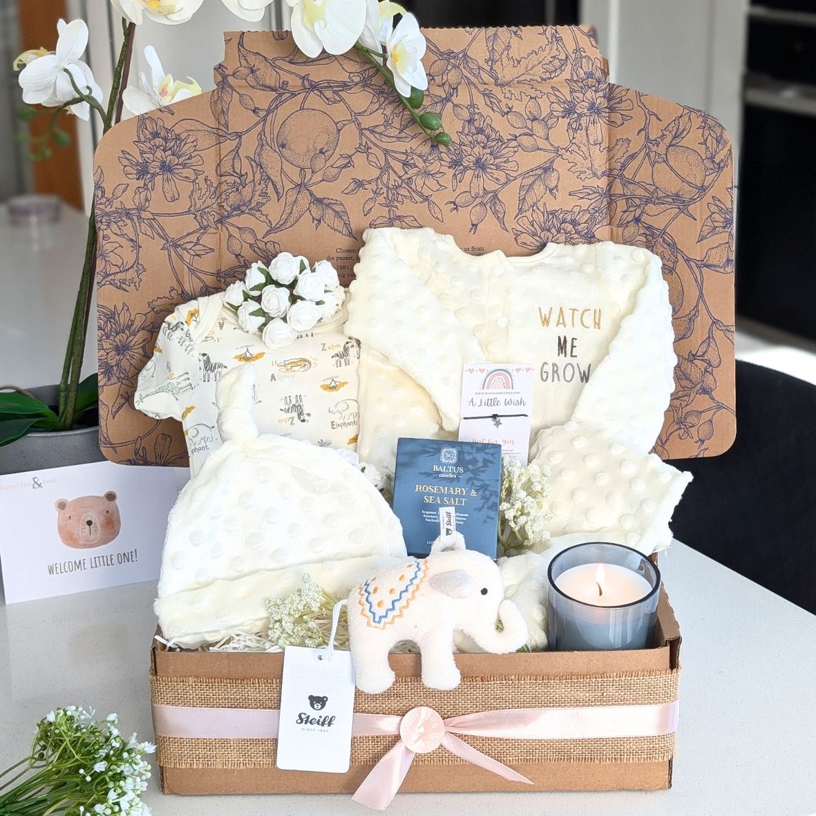 New baby gifts box with steiff elephant toy, white baby clothes set and present for mum by Bumbles and Boo.