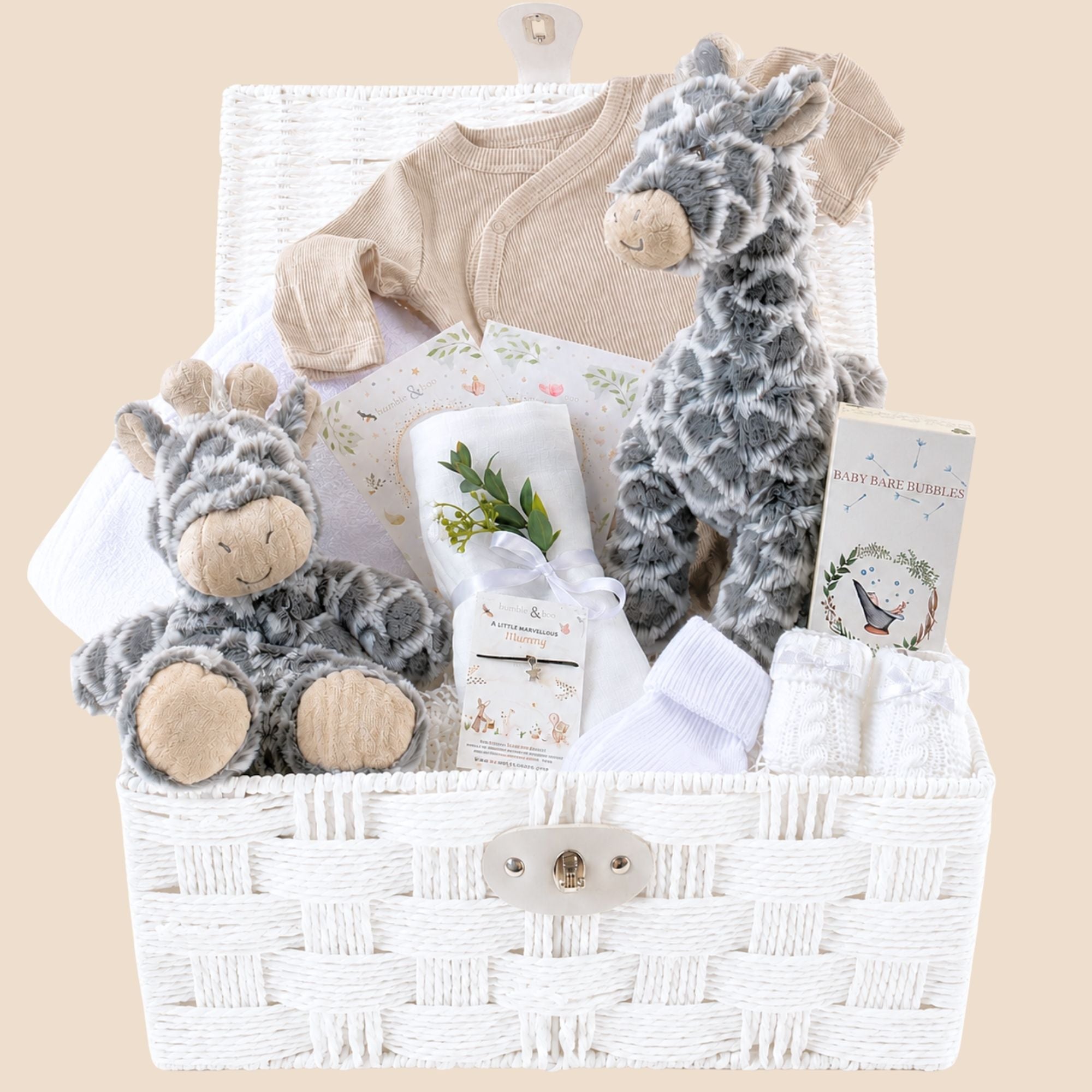 White baby gifts hamper with giraffe soft toy and matching giraffe comforter with hooded towel