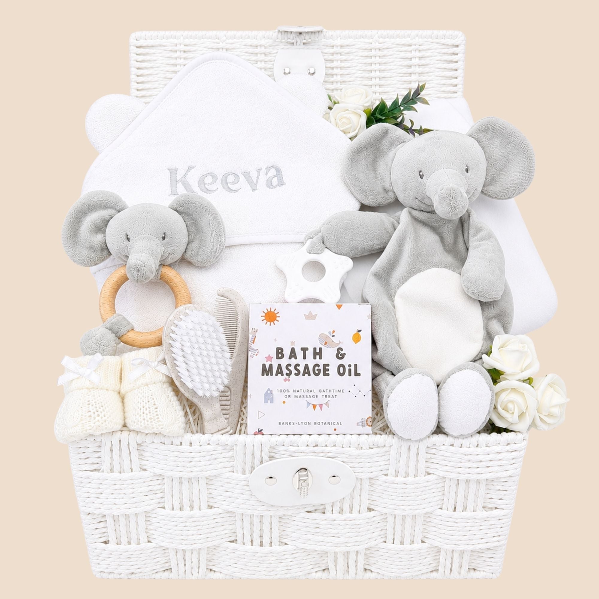 Baby gift basket with elephant comforter soft toy and matching rattle plus bath towel. 
