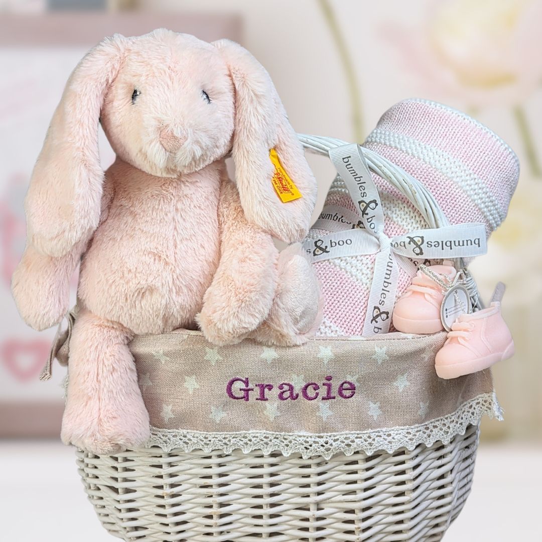 Personalisable baby girl gifts basket with steiff bunny and gifts for a new mum