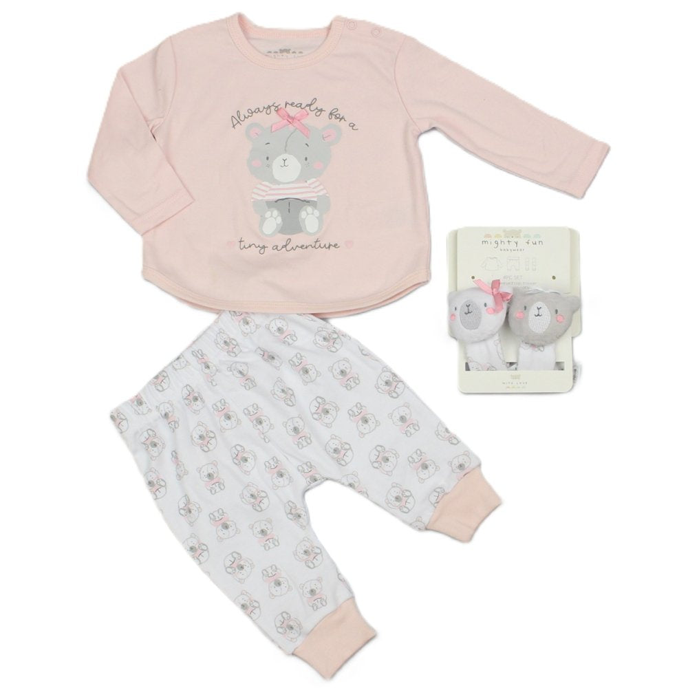 Full pink and white bear baby outfit with shoulder poppers, cuffed trousers and packaged wrist rattles on white.