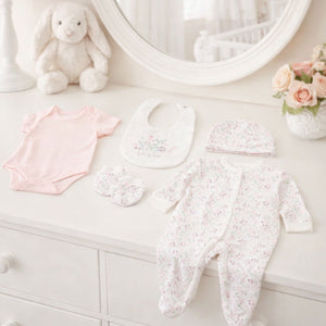 White and pink floral baby girl clothing set which says Little & Loved in embroidery