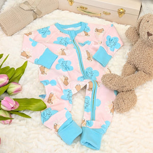 Baby girl clothing romper with a peter rabbit design and a zip.