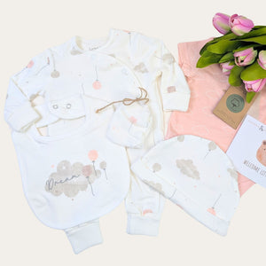 Baby girl clothes set with balloon pattern.