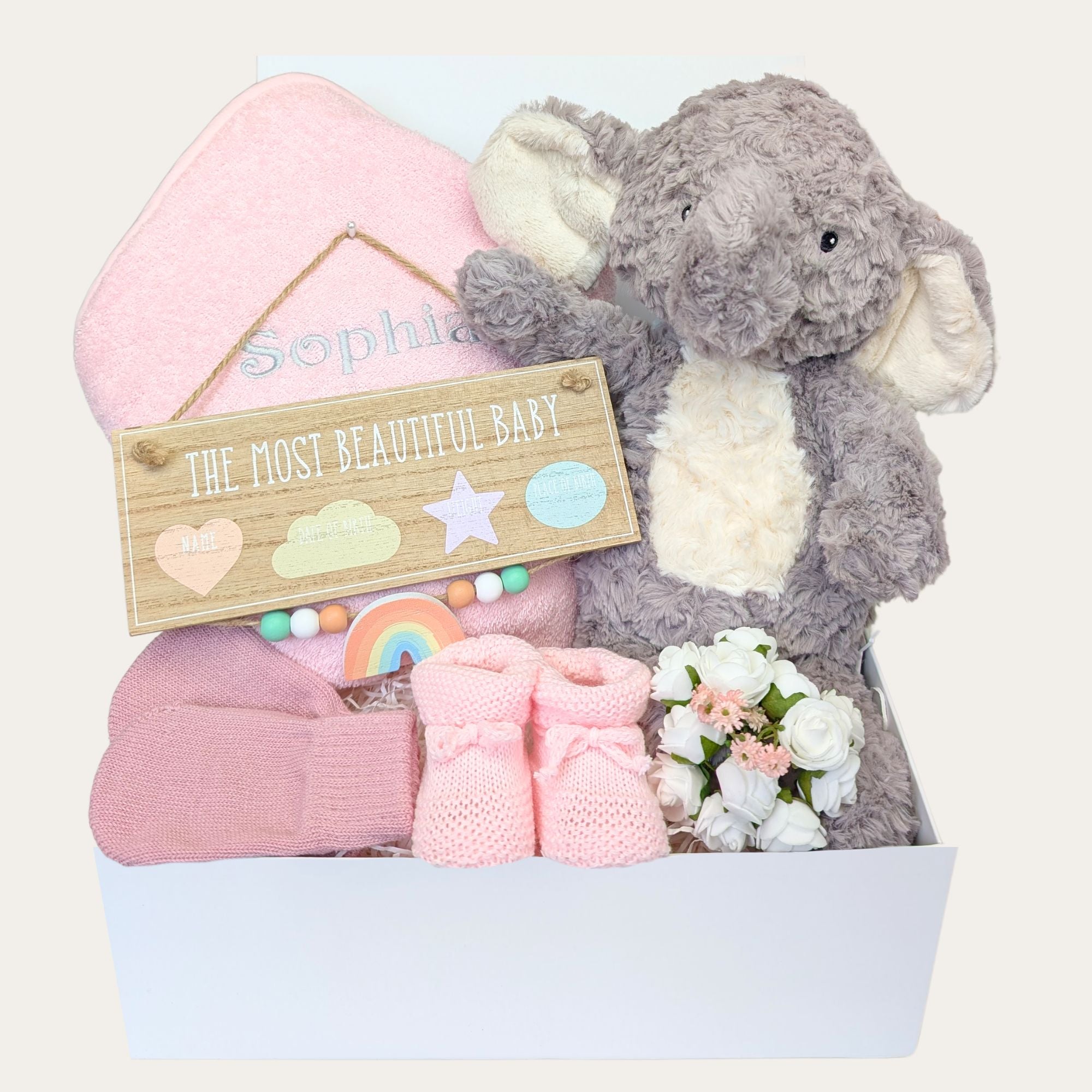 Personalised new baby girl gifts box with eco friendly elephant toy and pink baby accessories, hamper by Bumbles and Boo.