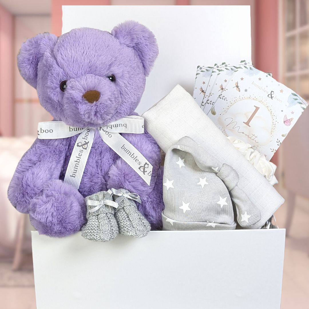 baby girl hamper box with teddy bear and baby essentials