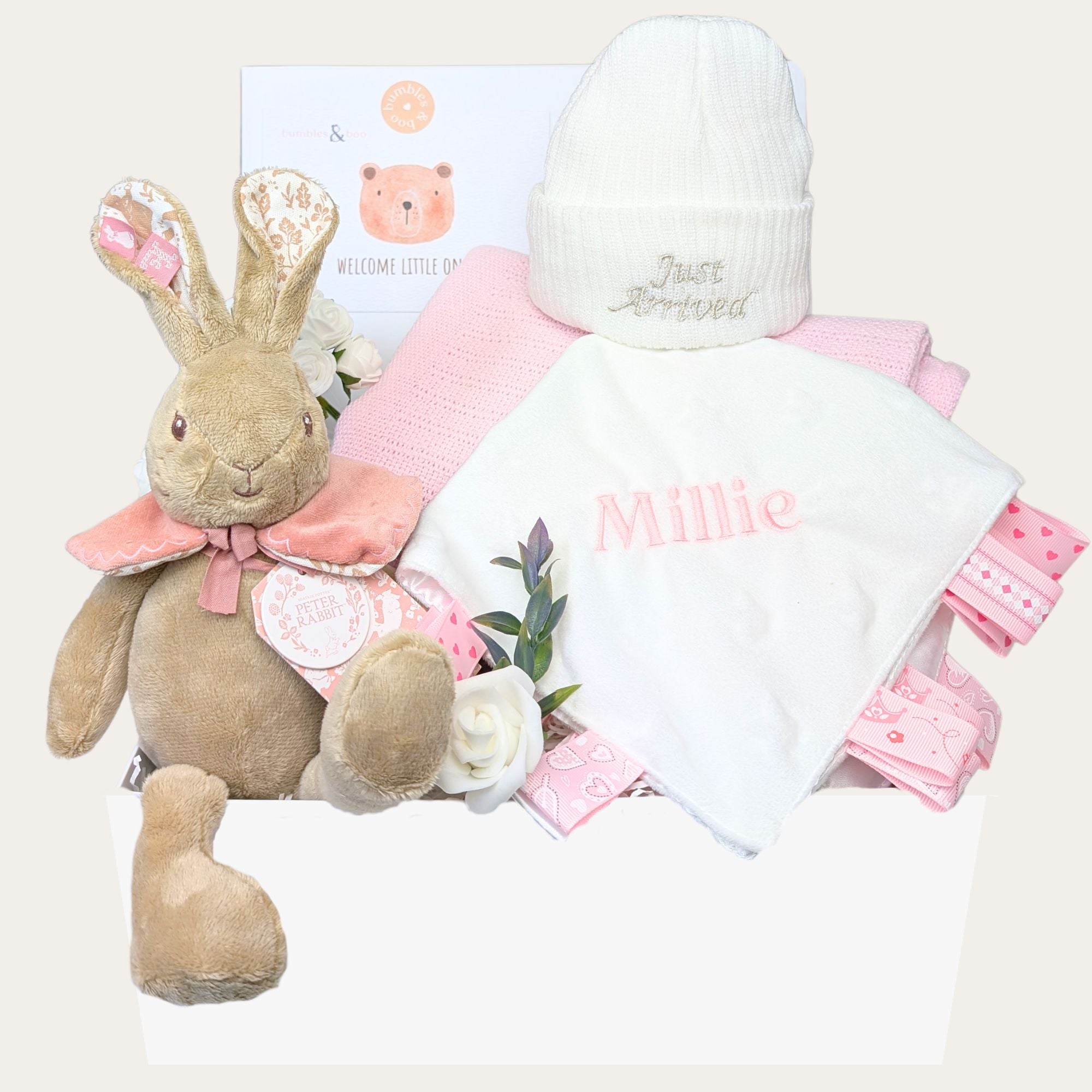 New baby girl gifts box by Bumbles and Boo. Presents in this hamper include Flopsy Bunny and pink personalised Millie comforter.