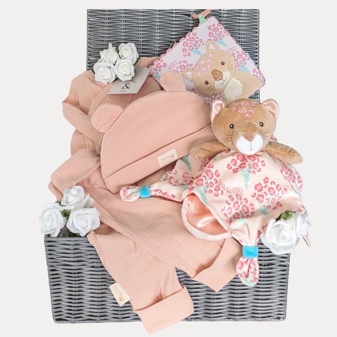 baby girl hamper gift with peach clothing set, leopard comforter toy and teething toy.