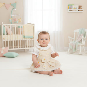 Baby girl taupe gingham floral outfit with lace hem, bow front detail and white puff sleeve top with matching bloomers