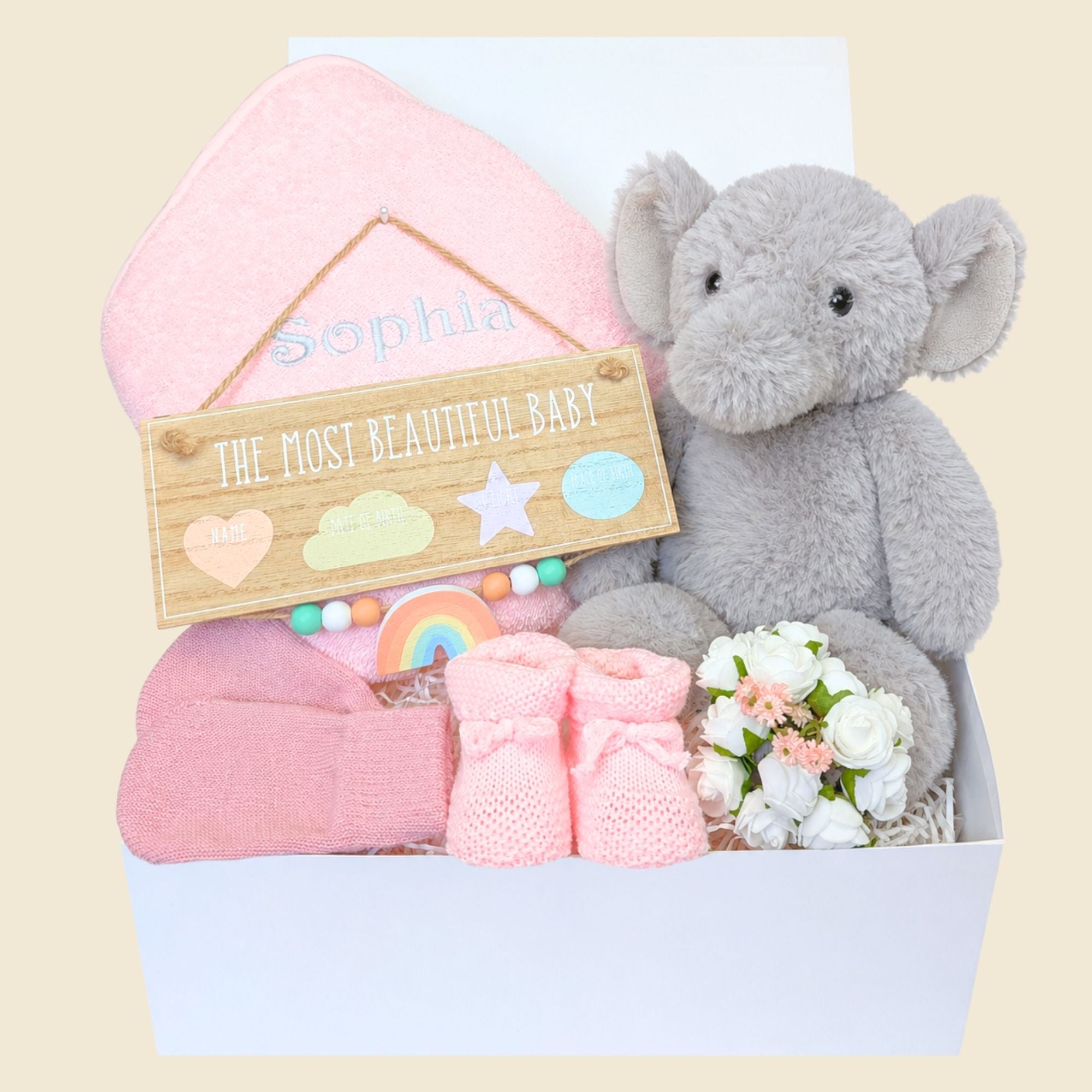 Personalised new baby girl hamper box with eco friendly gifts including elephant toy and pink baby accessories, hamper by Bumbles and Boo.